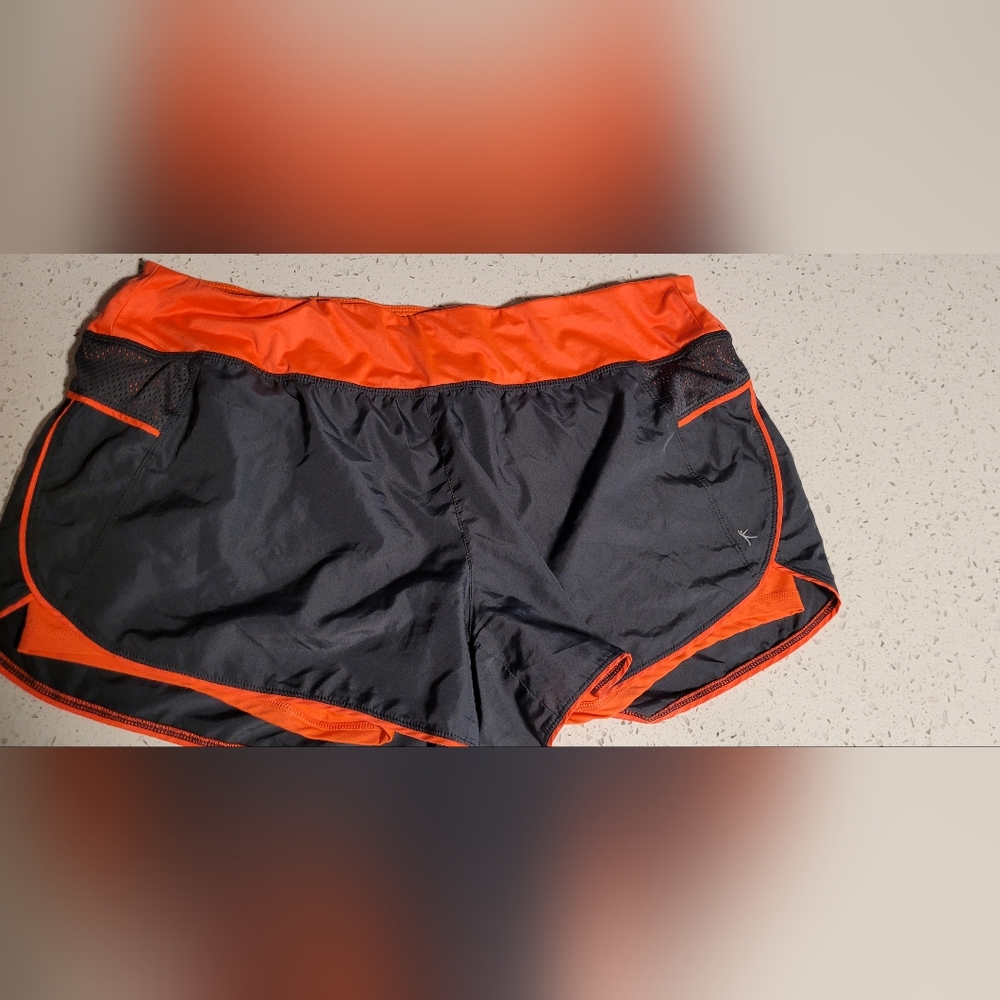Danskin Now grey and black semi-fitted shorts
